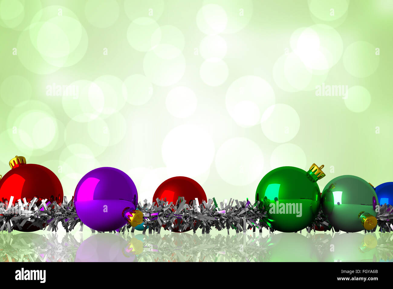 Composite image of christmas baubles and tinsel Stock Photo - Alamy