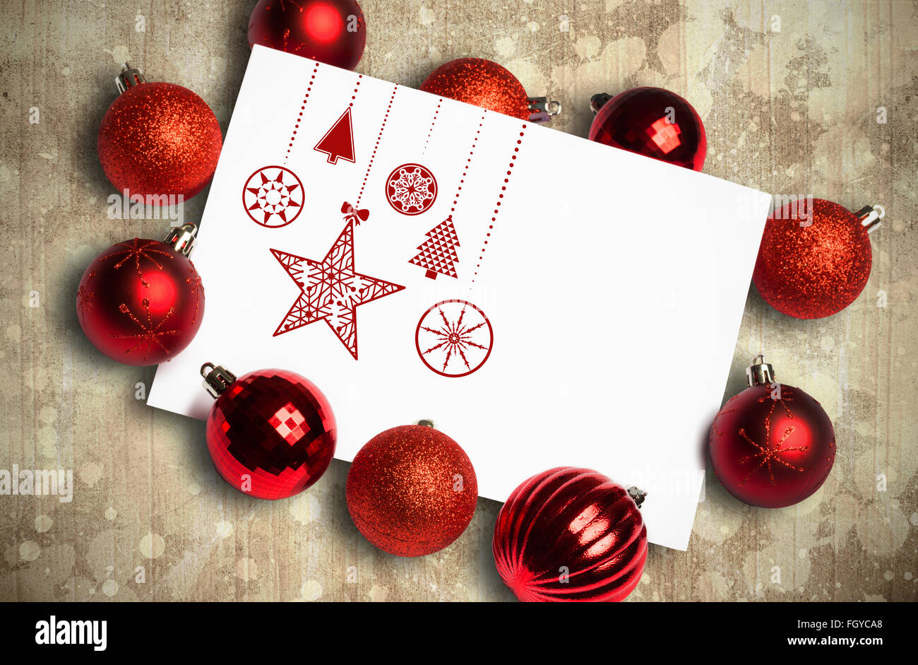 Composite image of hanging red christmas decorations Stock Photo - Alamy