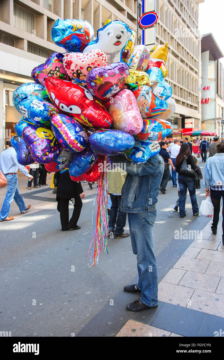colorful bunch helium balloon vendor seller street Stock Photo