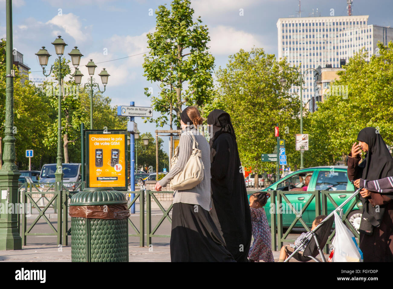 women burka burkha hijab covering face street Stock Photo