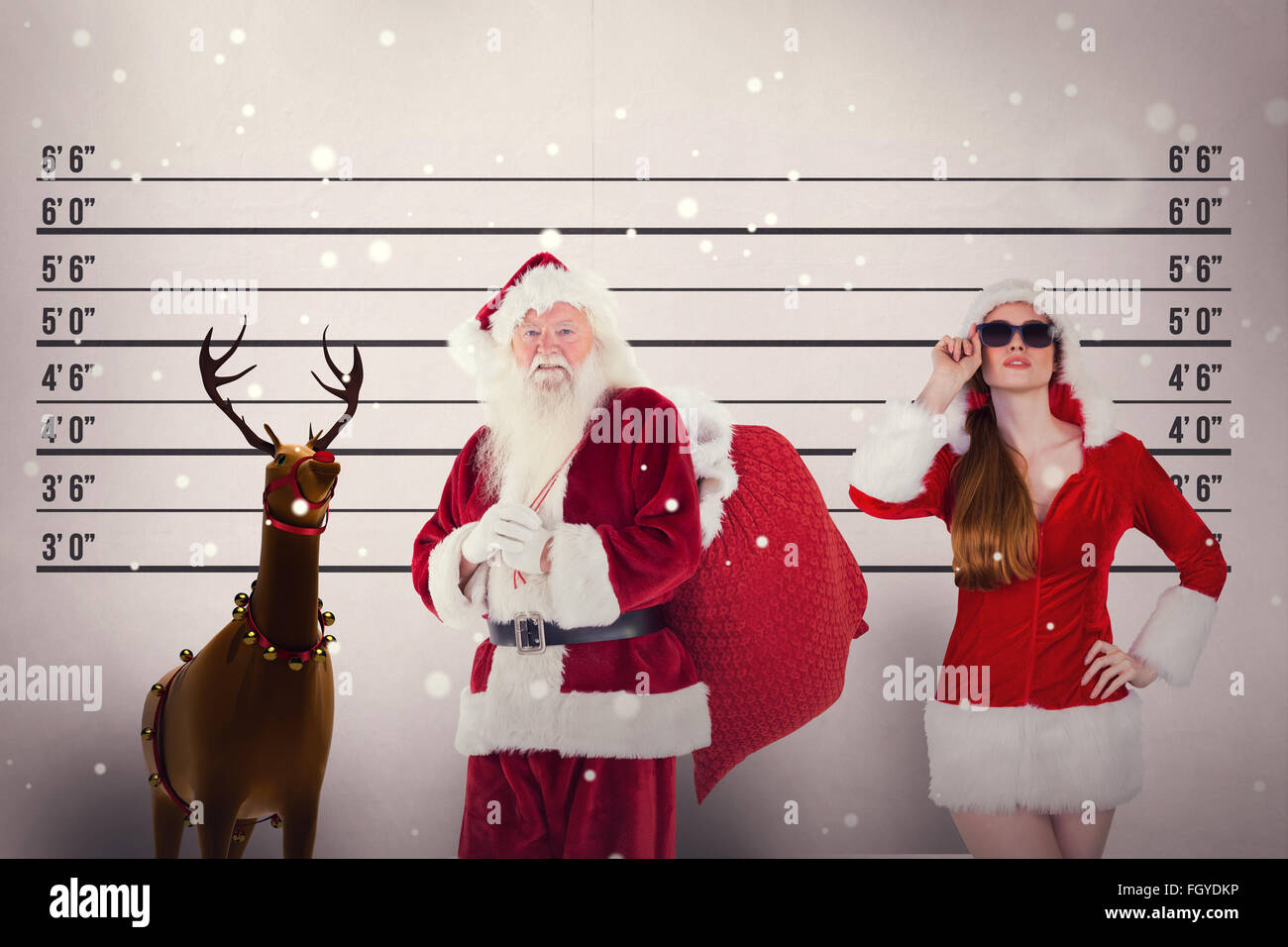 Composite image of santa carries his red bag Stock Photo - Alamy
