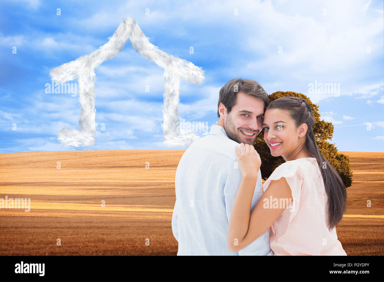 Composite image of attractive young couple smiling at camera Stock ...