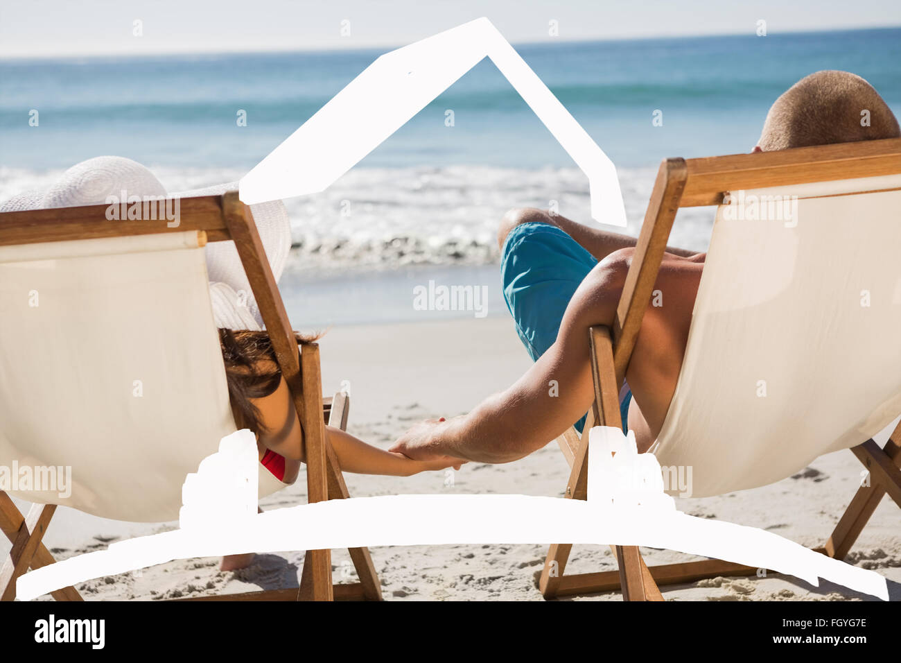 Couple sitting in deck chairs hi res stock photography and images