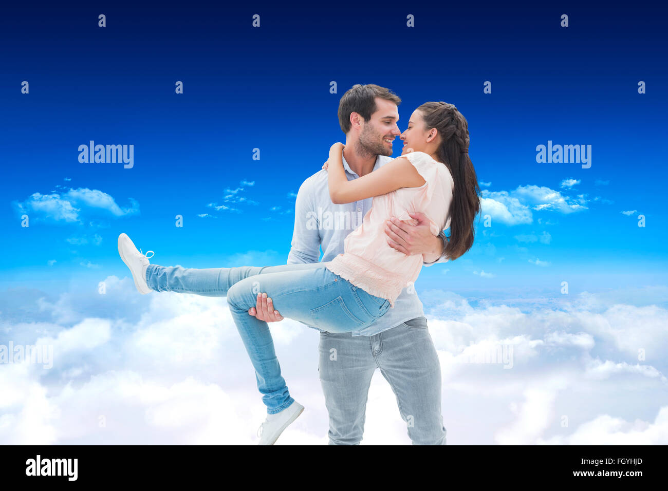 Composite image of attractive young couple having fun Stock Photo - Alamy