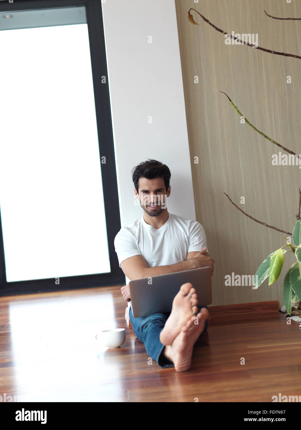 working on laptop computer from home Stock Photo - Alamy