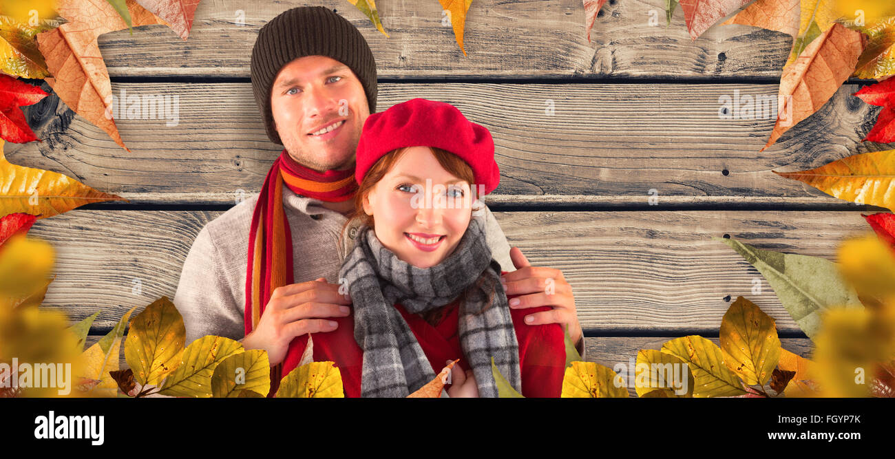 Composite image of couple smiling at the camera Stock Photo - Alamy