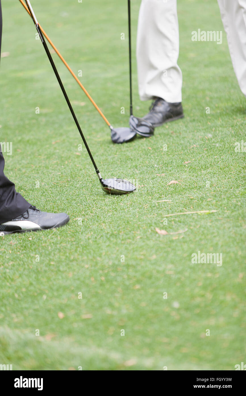 Two men on a golf green. Stock Photo