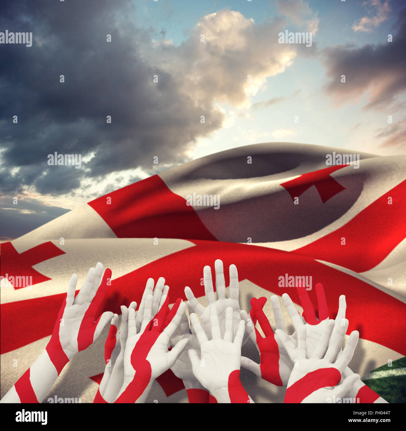 Composite image of people raising hands in the air Stock Photo - Alamy