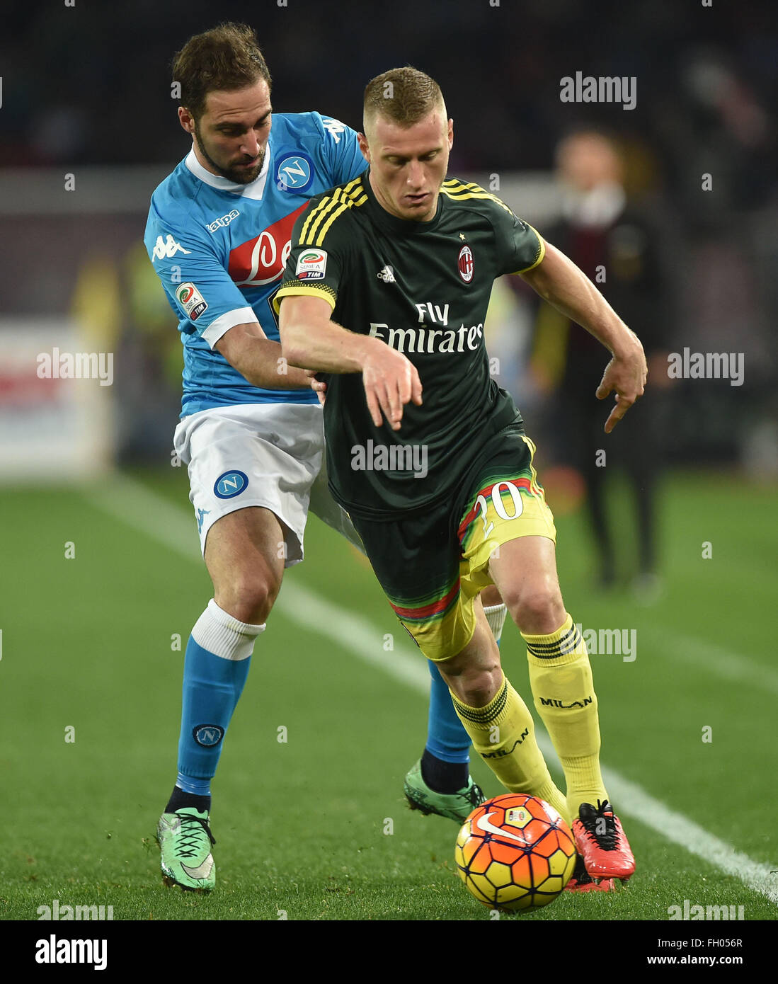 Naples, Italy. 22nd Feb, 2016. AC Milan's Ignazio Abate (R) vies with Napoli's Gonzalo Higuain during the Italian Serie A soccer match between SSC Napoli and AC Milan in Naples, Italy, Feb. 22, 2016. The match ended with a 1-1 draw. Credit:  Alberto Lingria/Xinhua/Alamy Live News Stock Photo