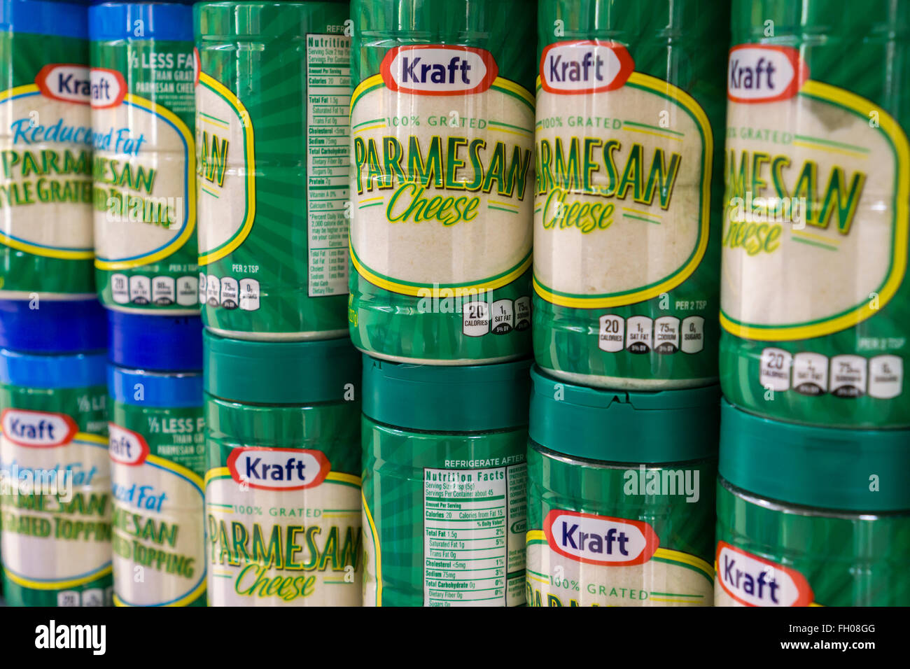 Containers of Kraft brand Parmesan cheese on a supermarket shelf in New