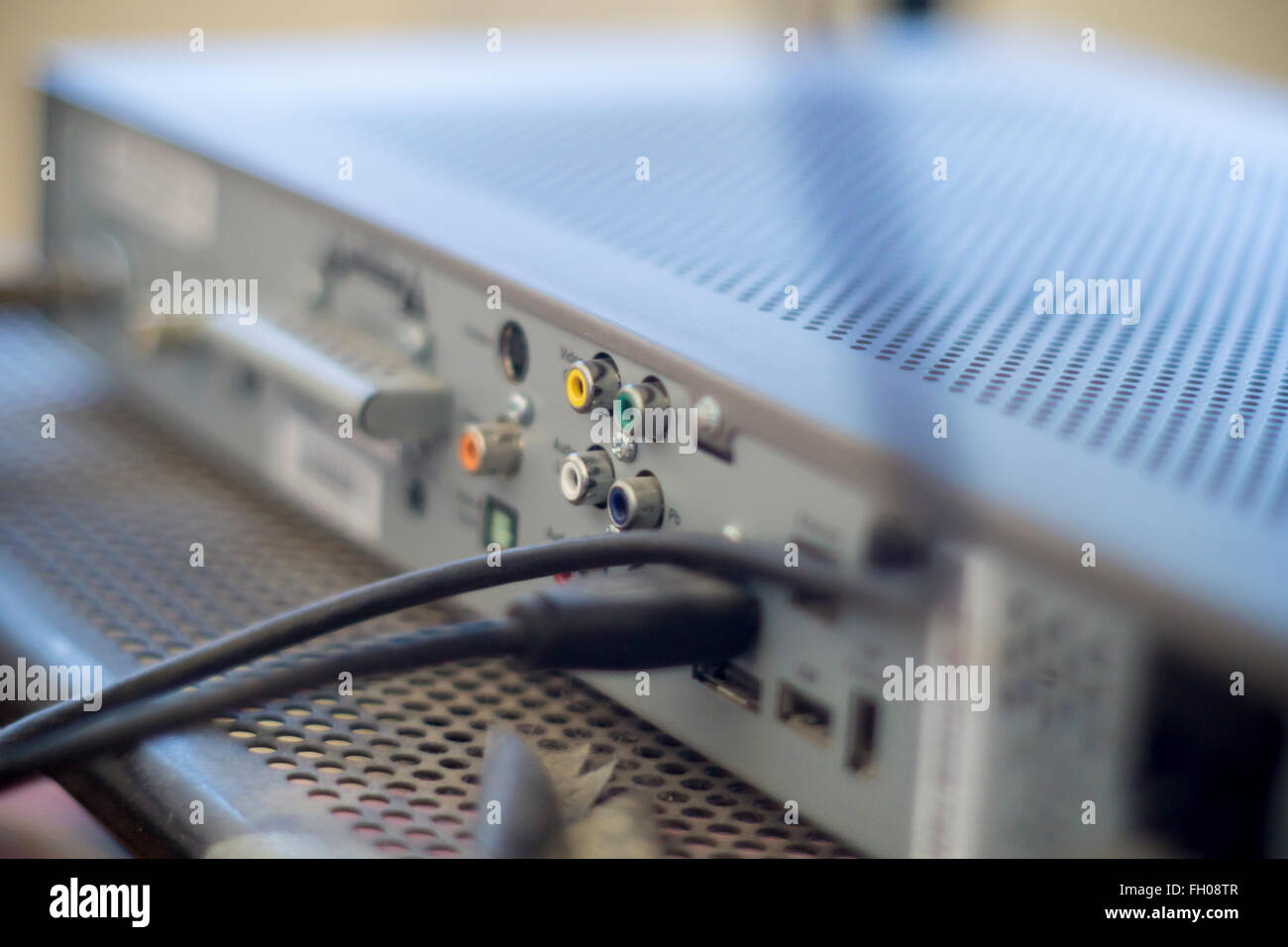 The rear of a Verizon Fios set top box, showing the various ports and