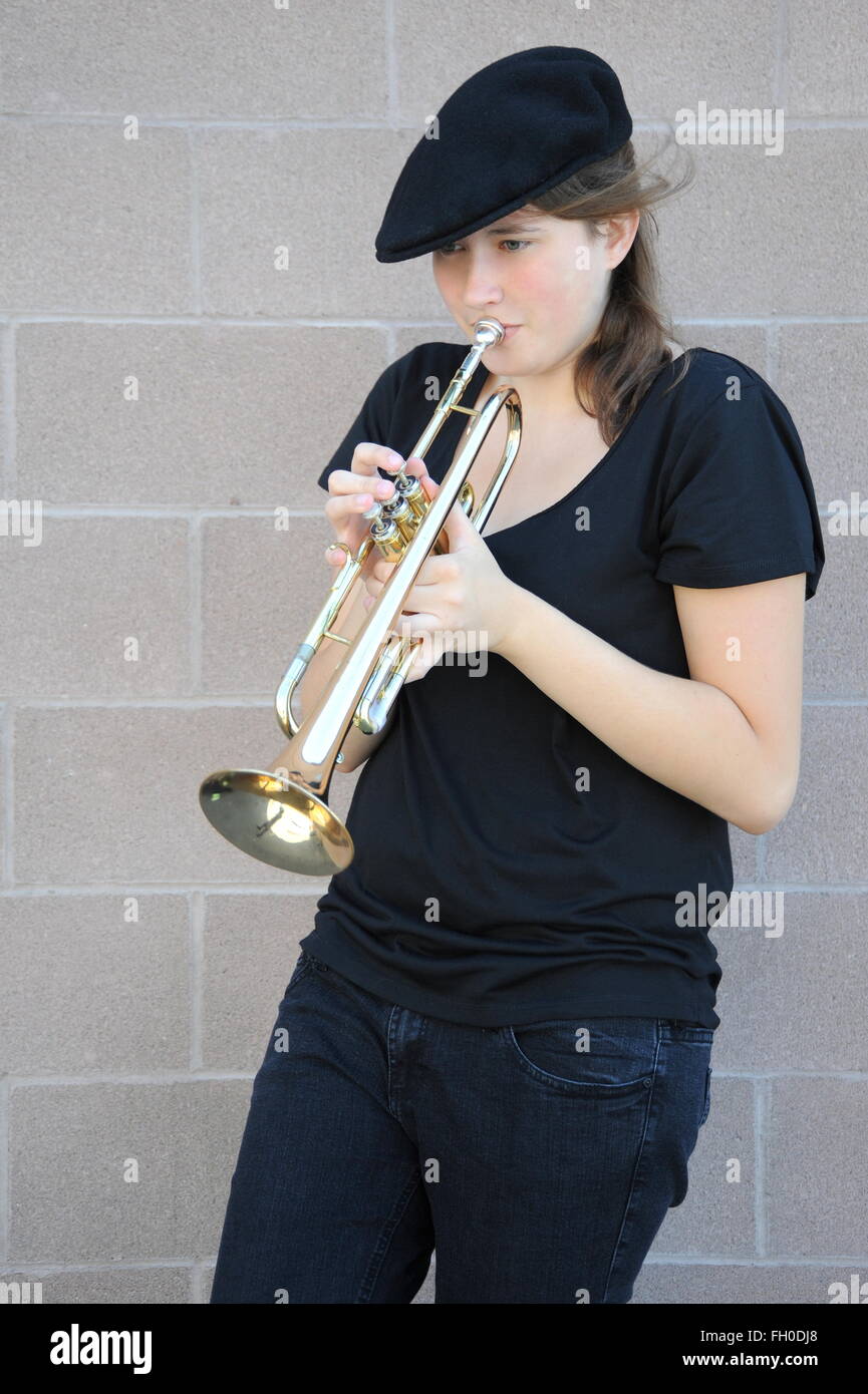 Female jazz trumpet player blowing hires stock photography and images