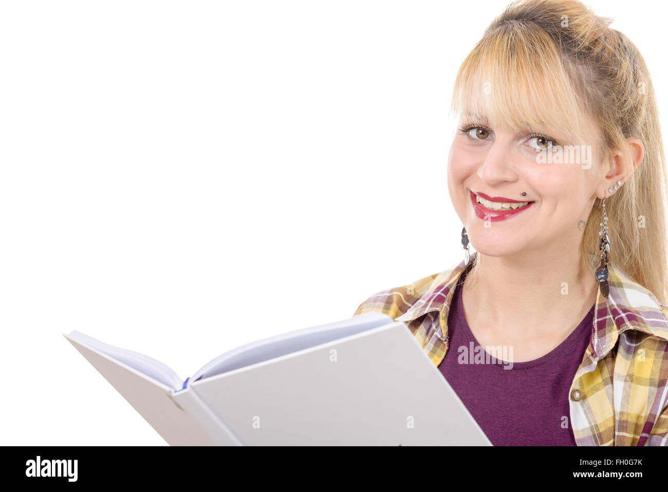 a young girl with book isolated on a white background Stock Photo - Alamy