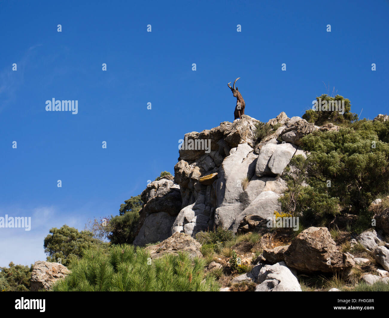 Spanish mountain goat sculpture, Sierra Blanca forest near Refugio