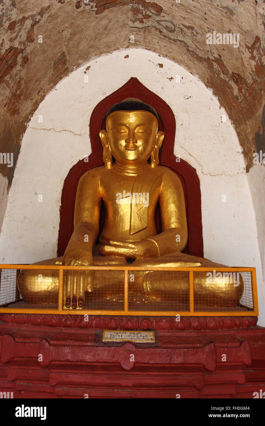 Thatbyinnyu,The old golden Buddha statue in pagoda temple in Bagan,Myanmar Stock Photo