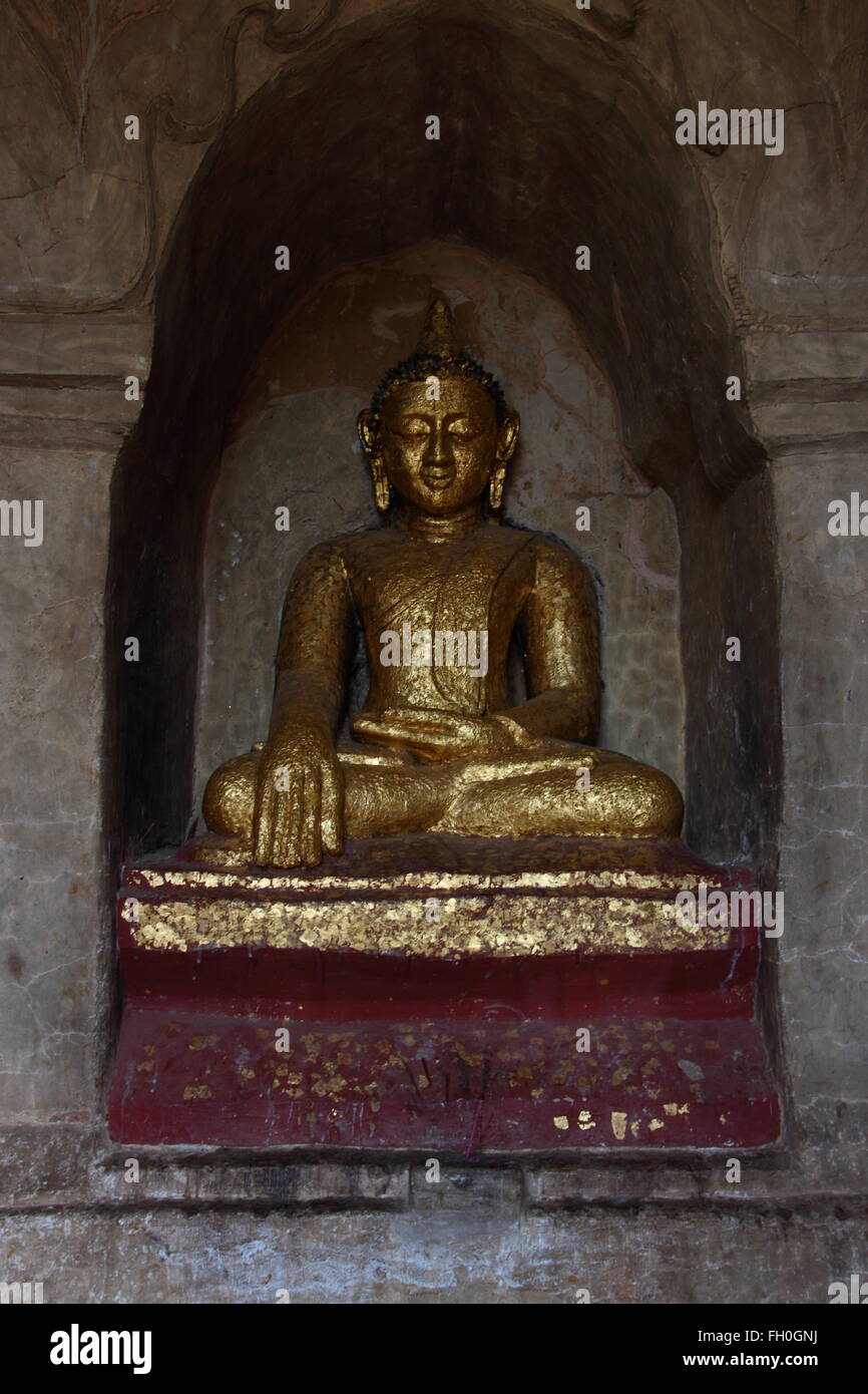 Thatbyinnyu,The old golden Buddha statue in pagoda temple in Bagan,Myanmar Stock Photo