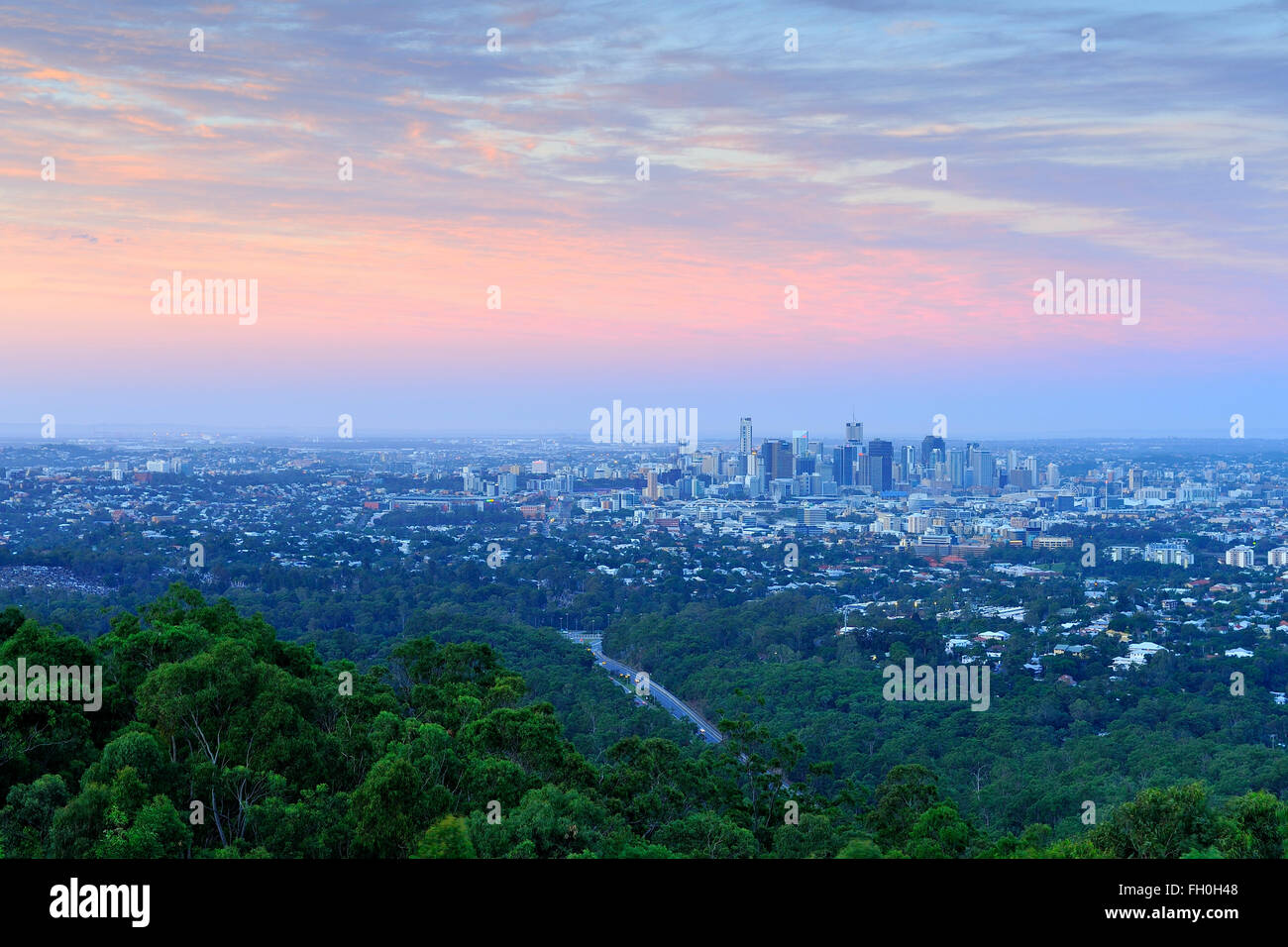 Colorful sunset sky over Mt. Cooh-tah, Brisbane Stock Photo