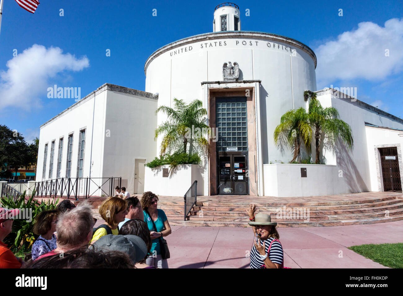 Miami Beach Florida,Washington Avenue,13th Street Post Office,exterior,outside exterior,Art Deco Federal,adult adults,woman female women,guide,speakin Stock Photo