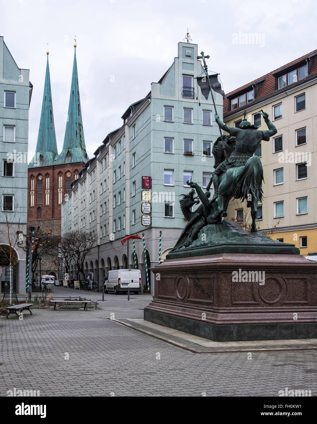 Nikolaiviertel, Berlin - Historic old town with St Nicholas church & bronze sculpture of Saint George slaying a dragon Stock Photo