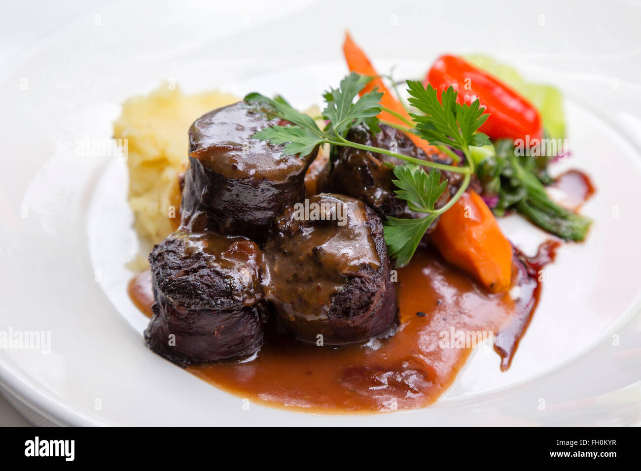 An exquisite Boudin Noir with a modern twist to this traditional dish from Southern France Stock Photo