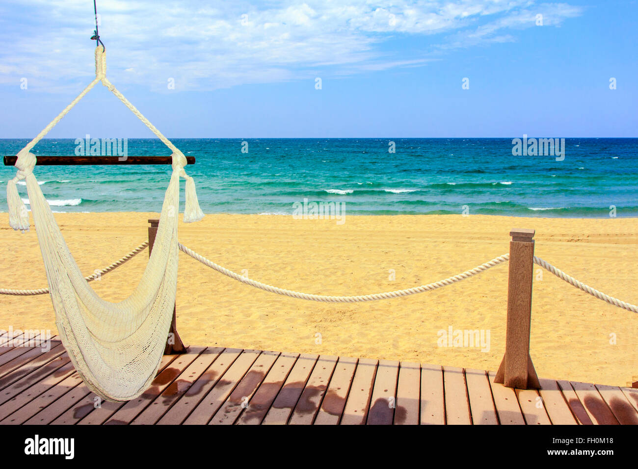 A beautiful view of the mexican coastline and the Sea of Cortez with an inviting hammock Stock Photo