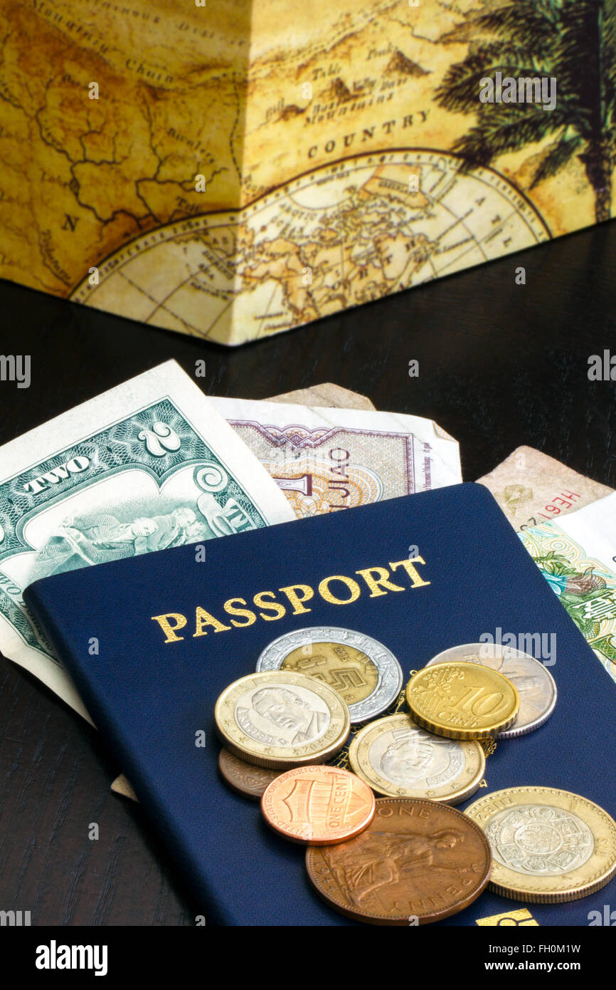 A passport with foreign currency Stock Photo