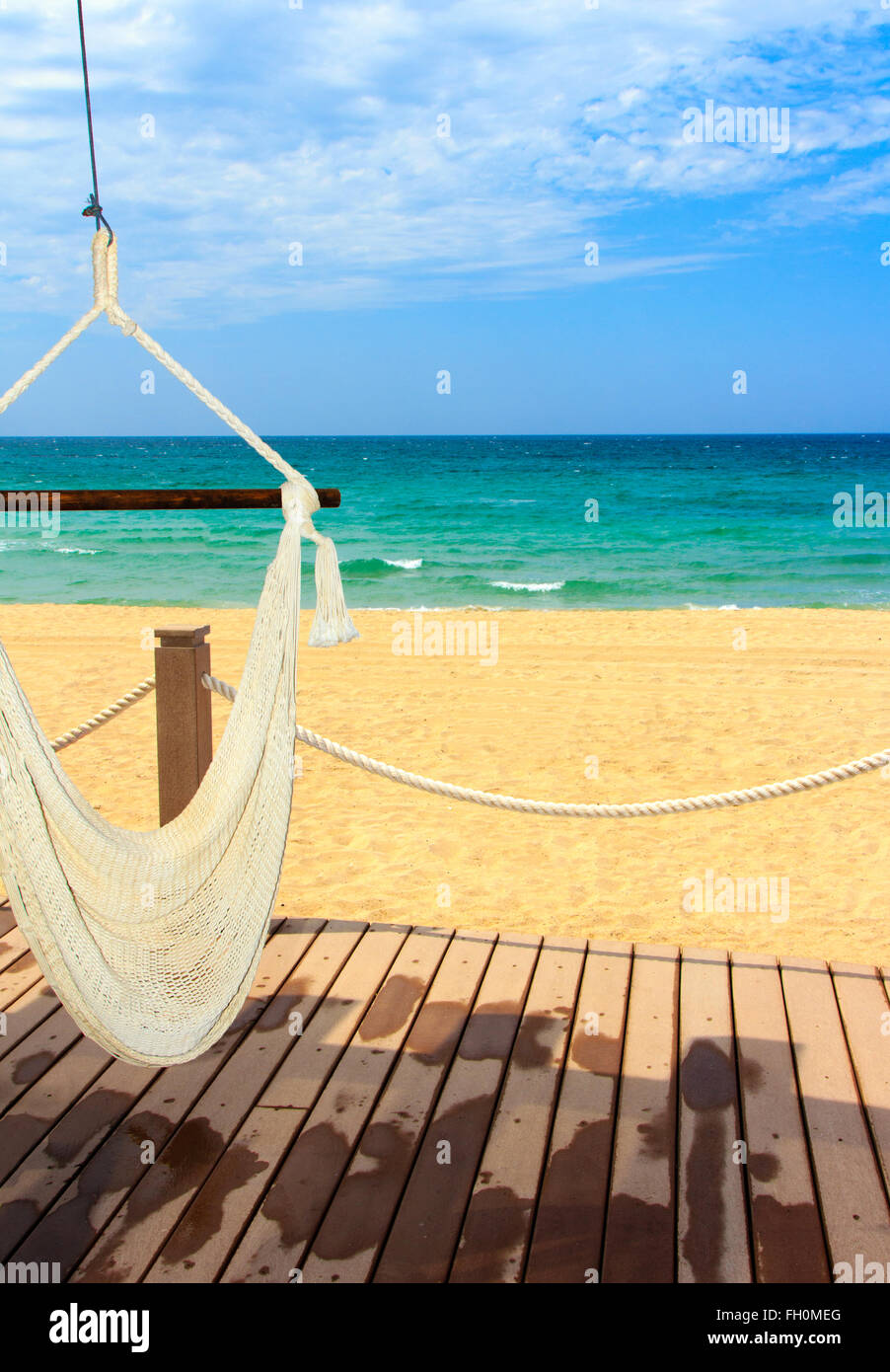 A beautiful view of the mexican coastline and the Sea of Cortez with an inviting hammock, portrait Stock Photo