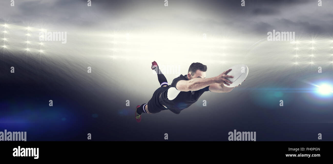 Rugby player mid air with ball hi-res stock photography and images - Alamy