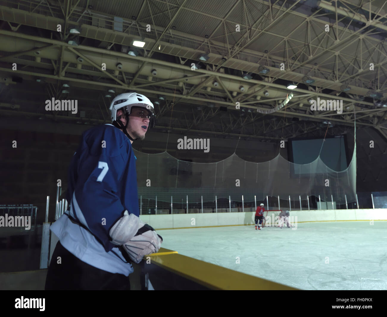 hockey players on bench Stock Photo Alamy