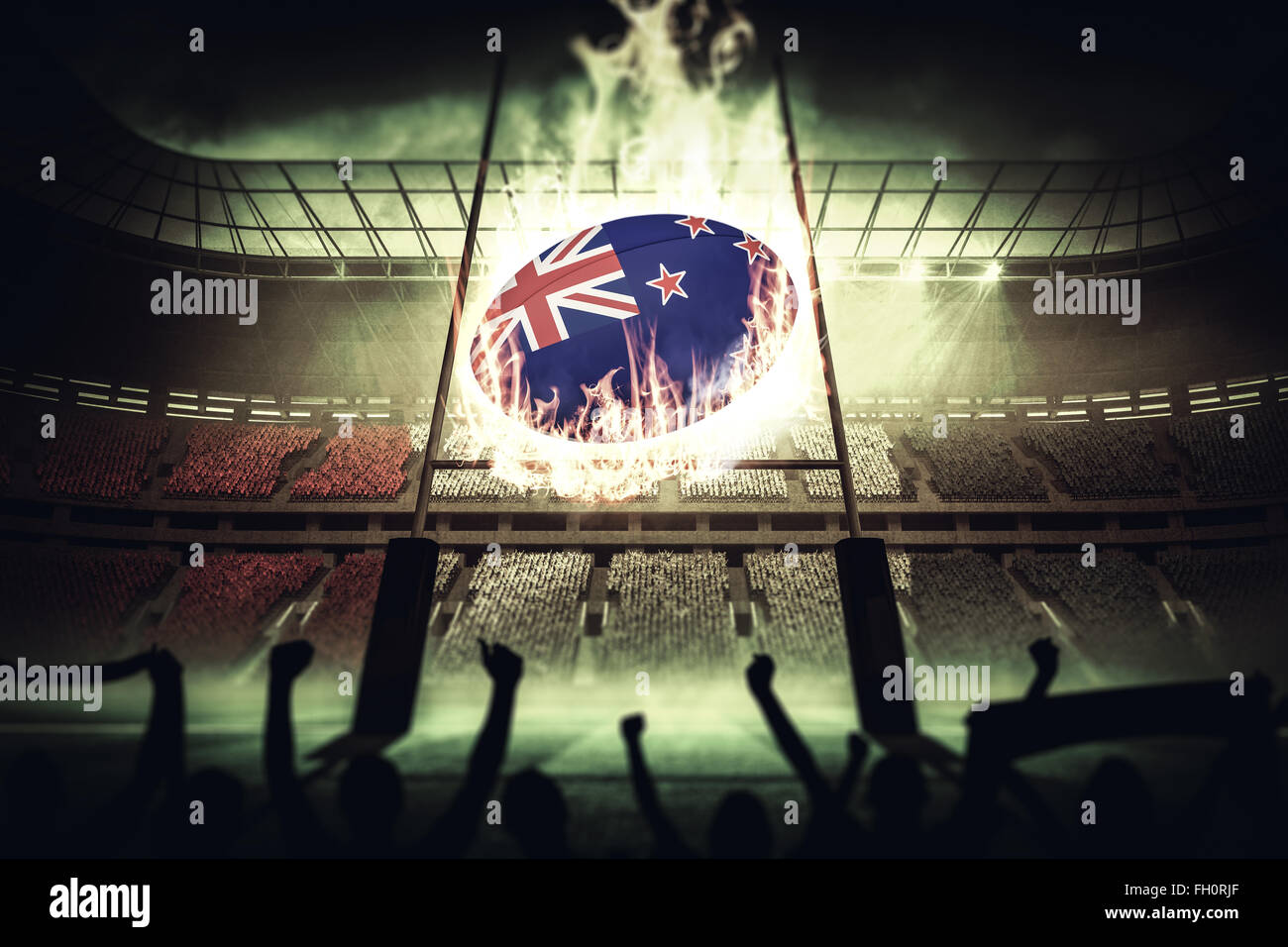 Composite image of silhouettes of football supporters Stock Photo