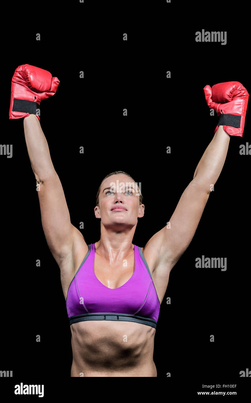 Winner female boxer with arms raised Stock Photo Alamy