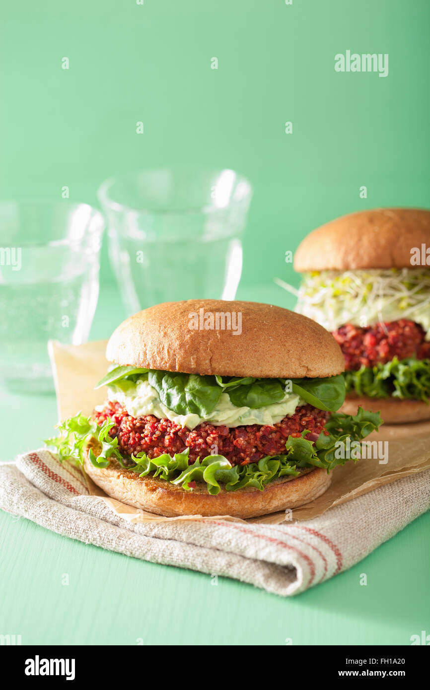 veggie beet and quinoa burger with avocado dressing Stock Photo Alamy