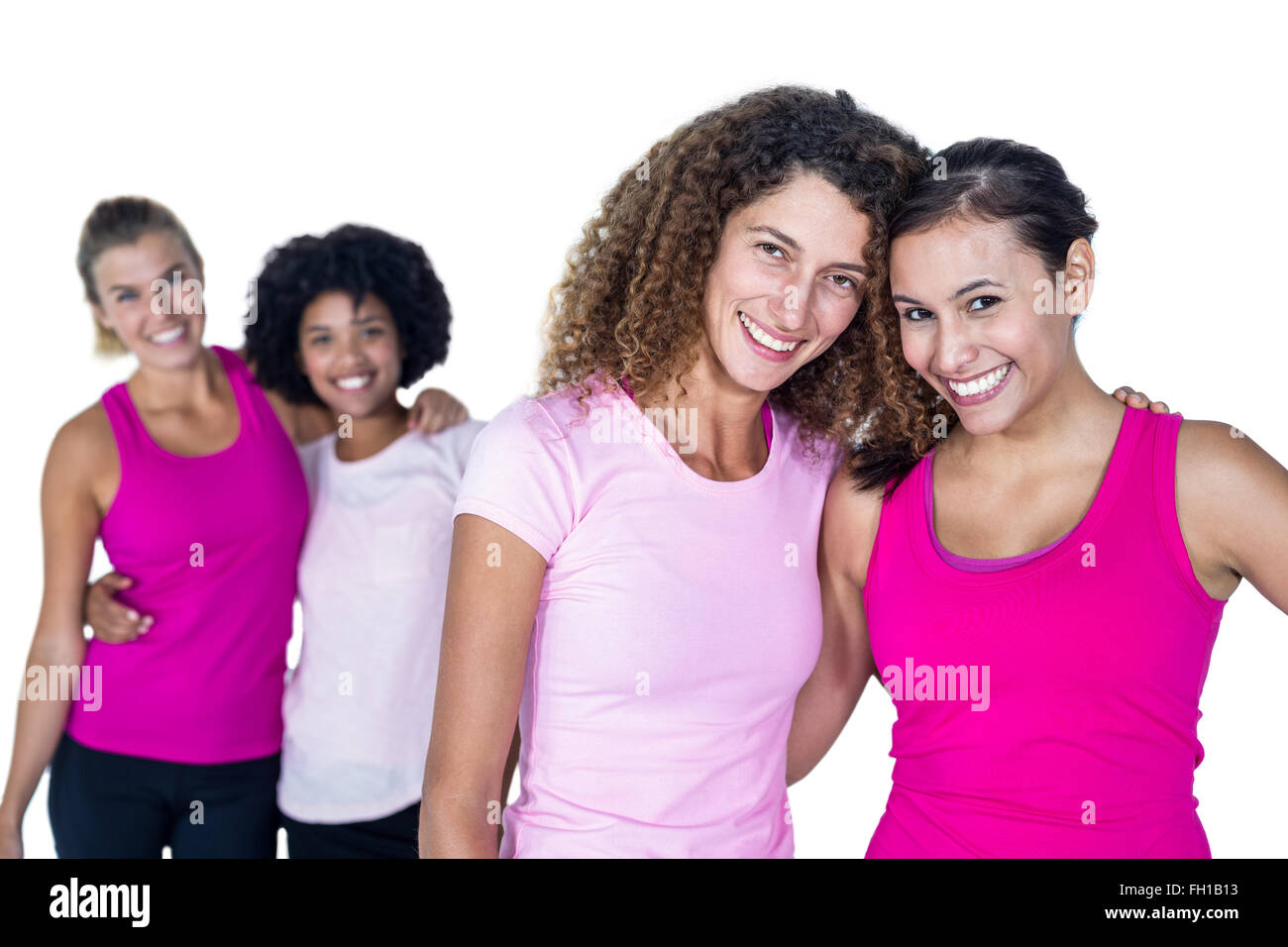 Portrait of happy women with arms around Stock Photo - Alamy