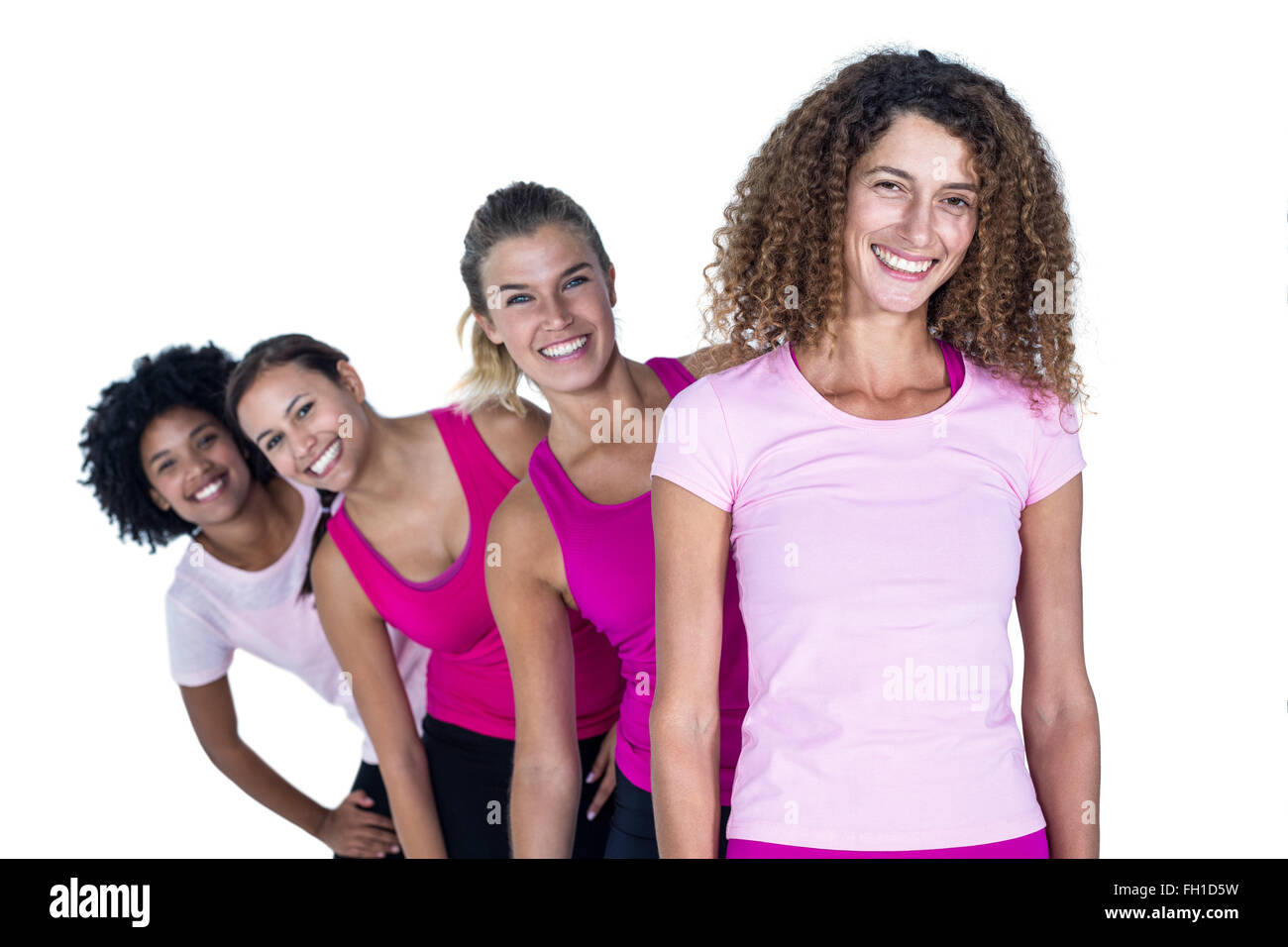 Portrait of smiling women standing in row Stock Photo - Alamy