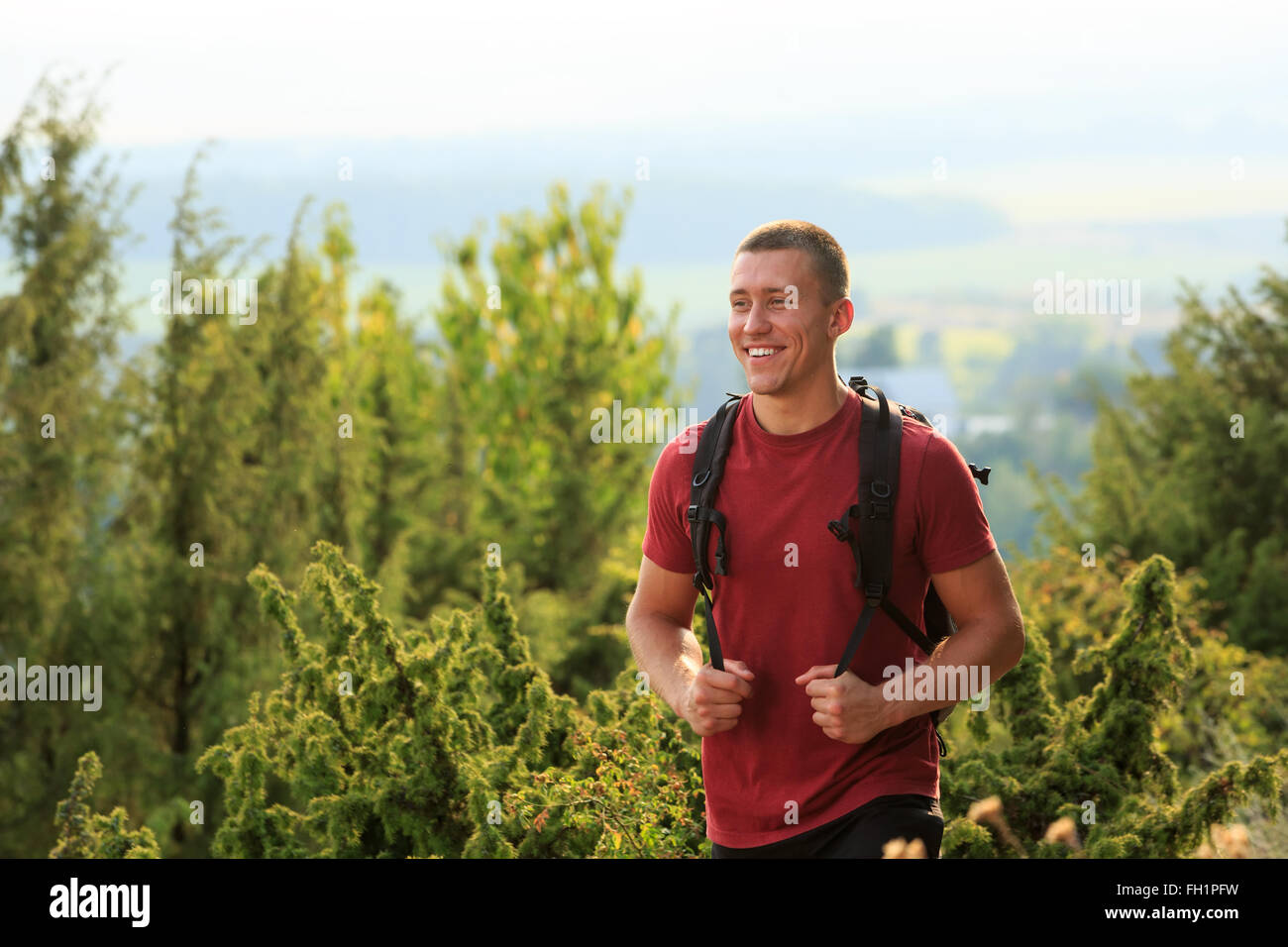Strong man backpack hiking hi-res stock photography and images - Alamy