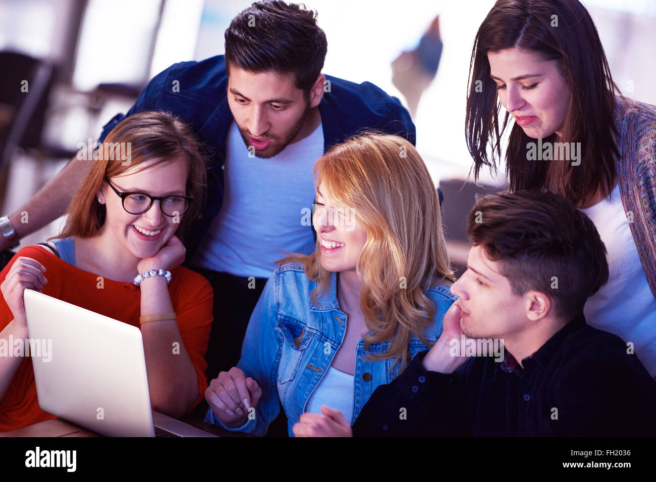 students group working on school project together Stock Photo - Alamy