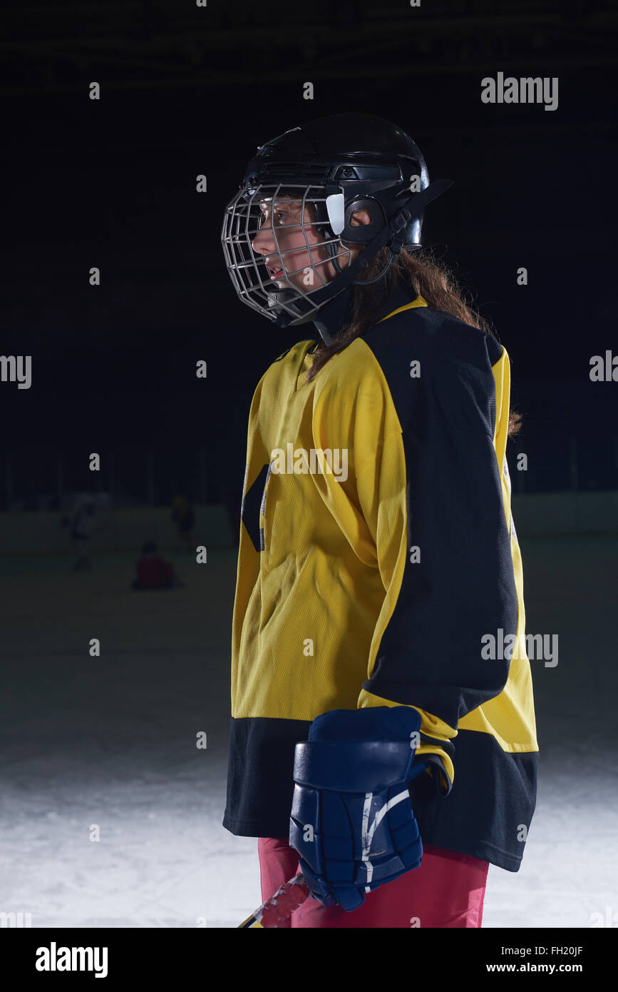 Child wearing hockey helmet hi-res stock photography and images