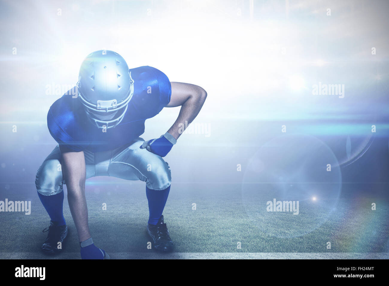 Composite image of american football player in uniform bending Stock