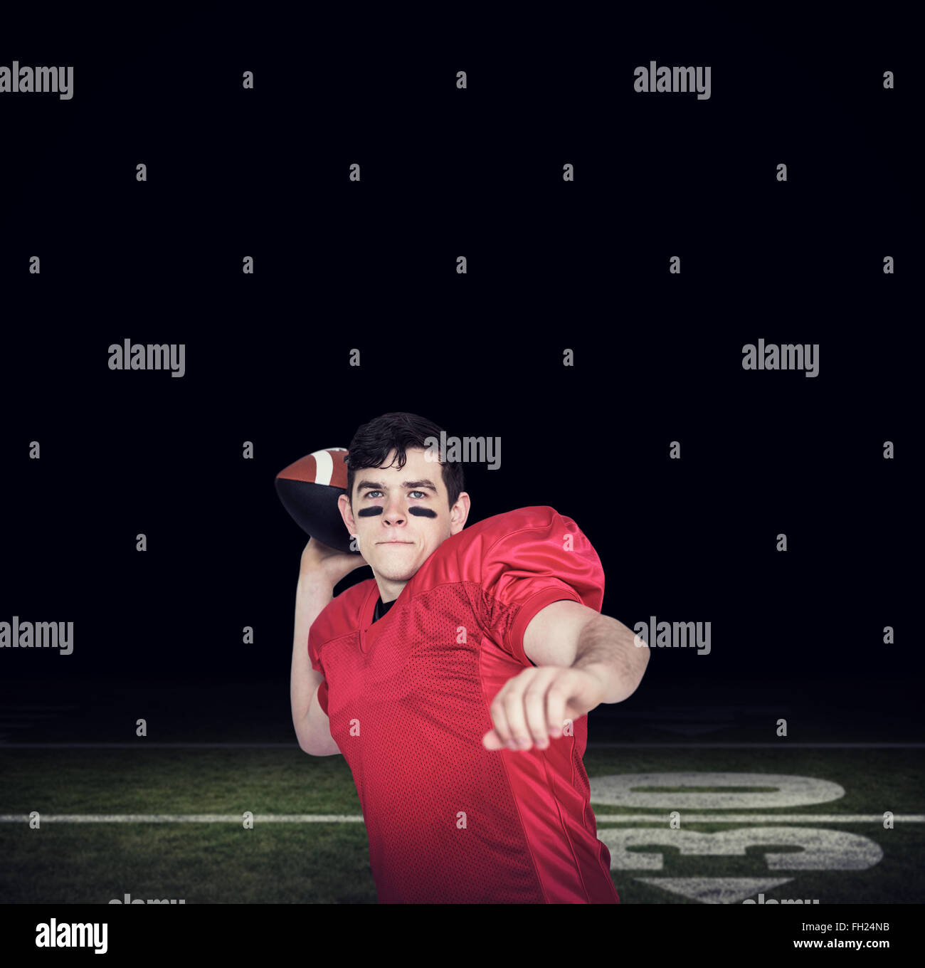 Composite image of american football player throwing a ball Stock Photo