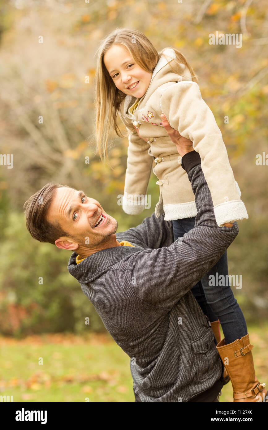 Happy father carrying his cute daughter Stock Photo - Alamy
