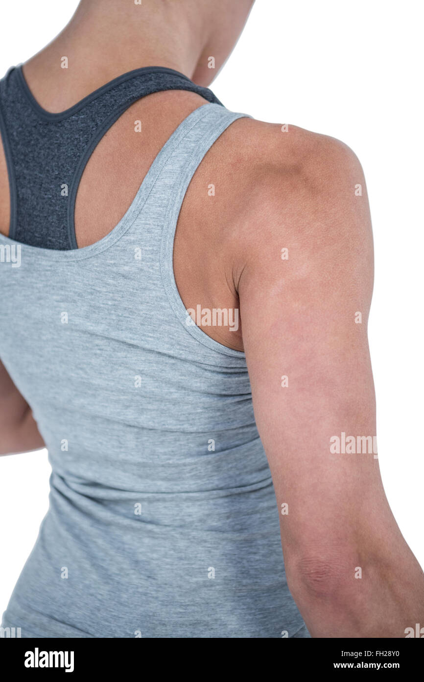 Rear view of muscular woman looking down Stock Photo - Alamy