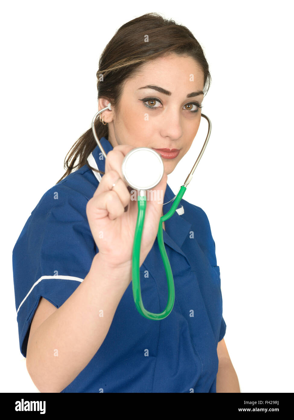 Young Female Doctor Or Physician Dealing With The Coronavirus Or Covid-19 Pandemic, Alone In Uniform, Isolated On White Stock Photo