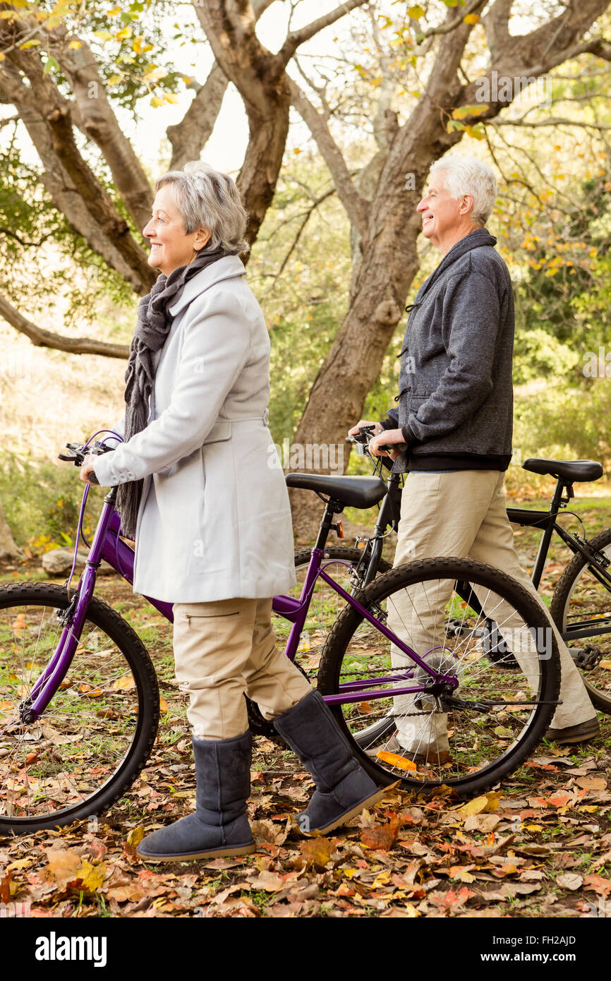 Senior couple in the park Stock Photo - Alamy