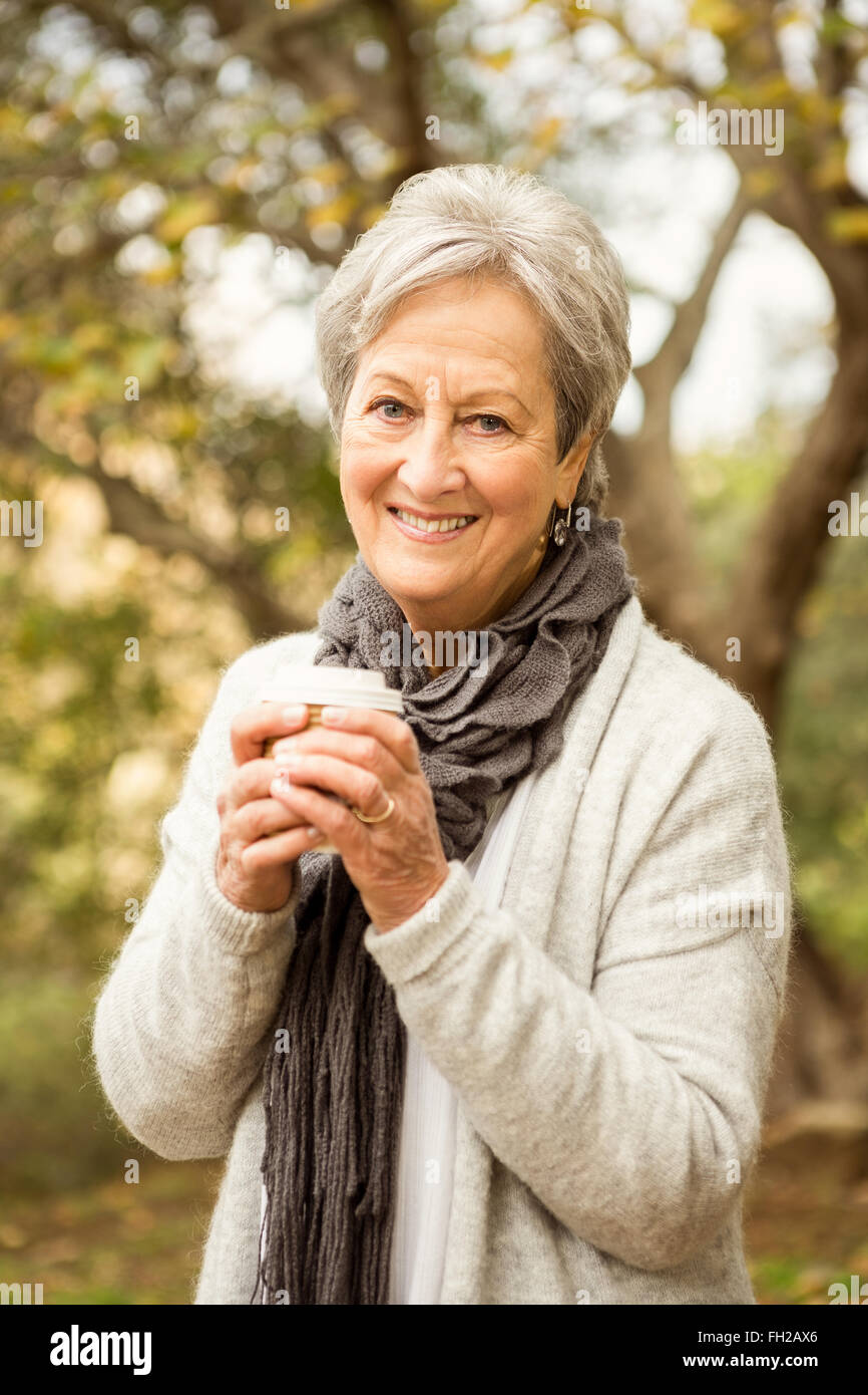Senior woman in the park Stock Photo - Alamy