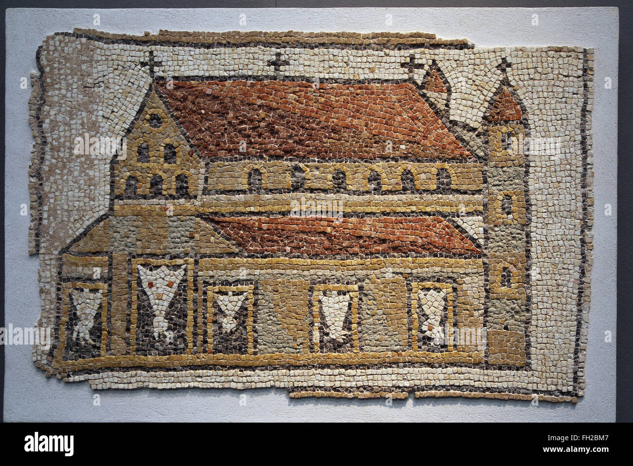 Roman mosaic of a Church with Towers, Eastern Mediterranean, 5th century AD. The church has three naves. Early Roman Christian. Stock Photo