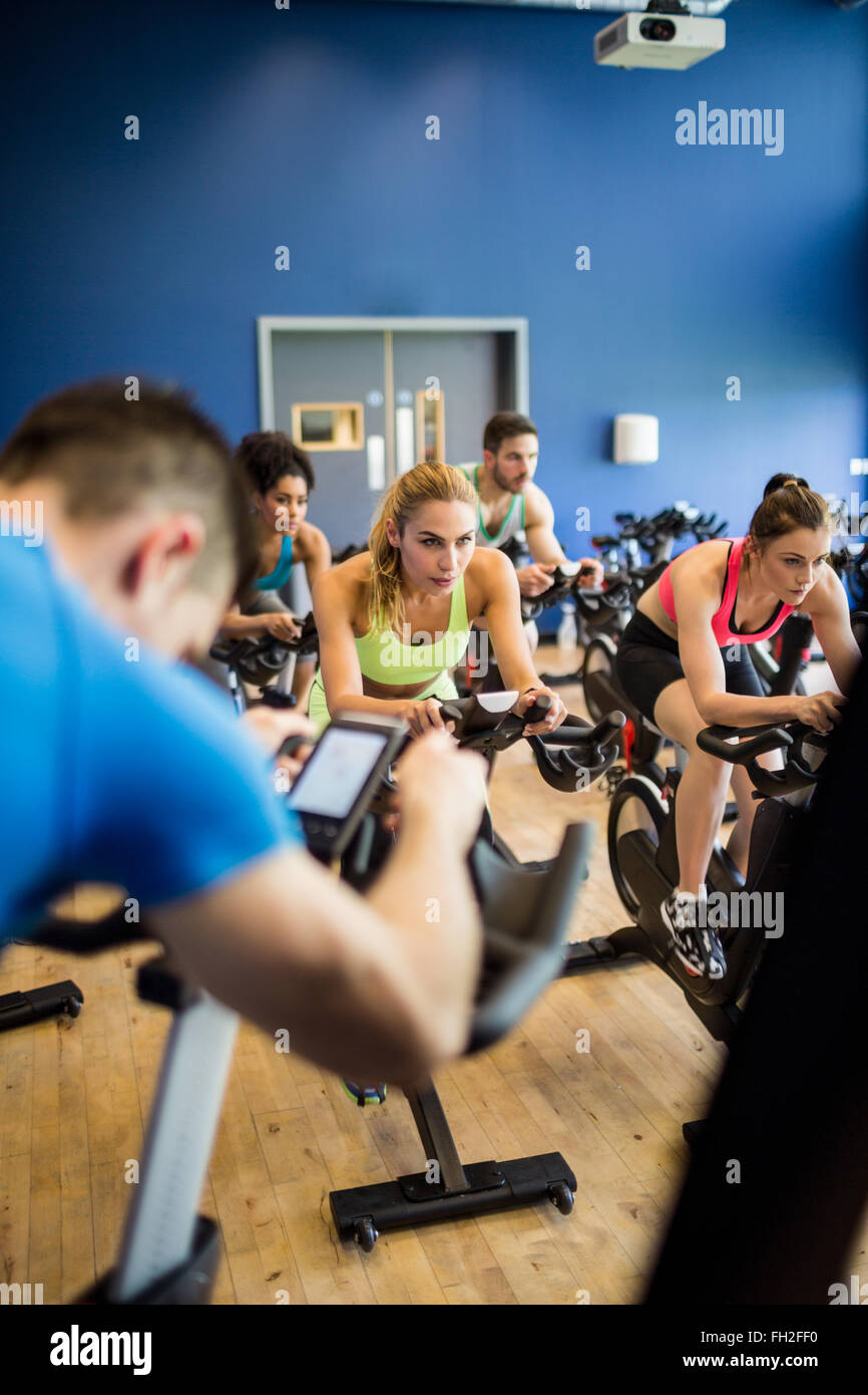 Fit people in a spin class Stock Photo - Alamy