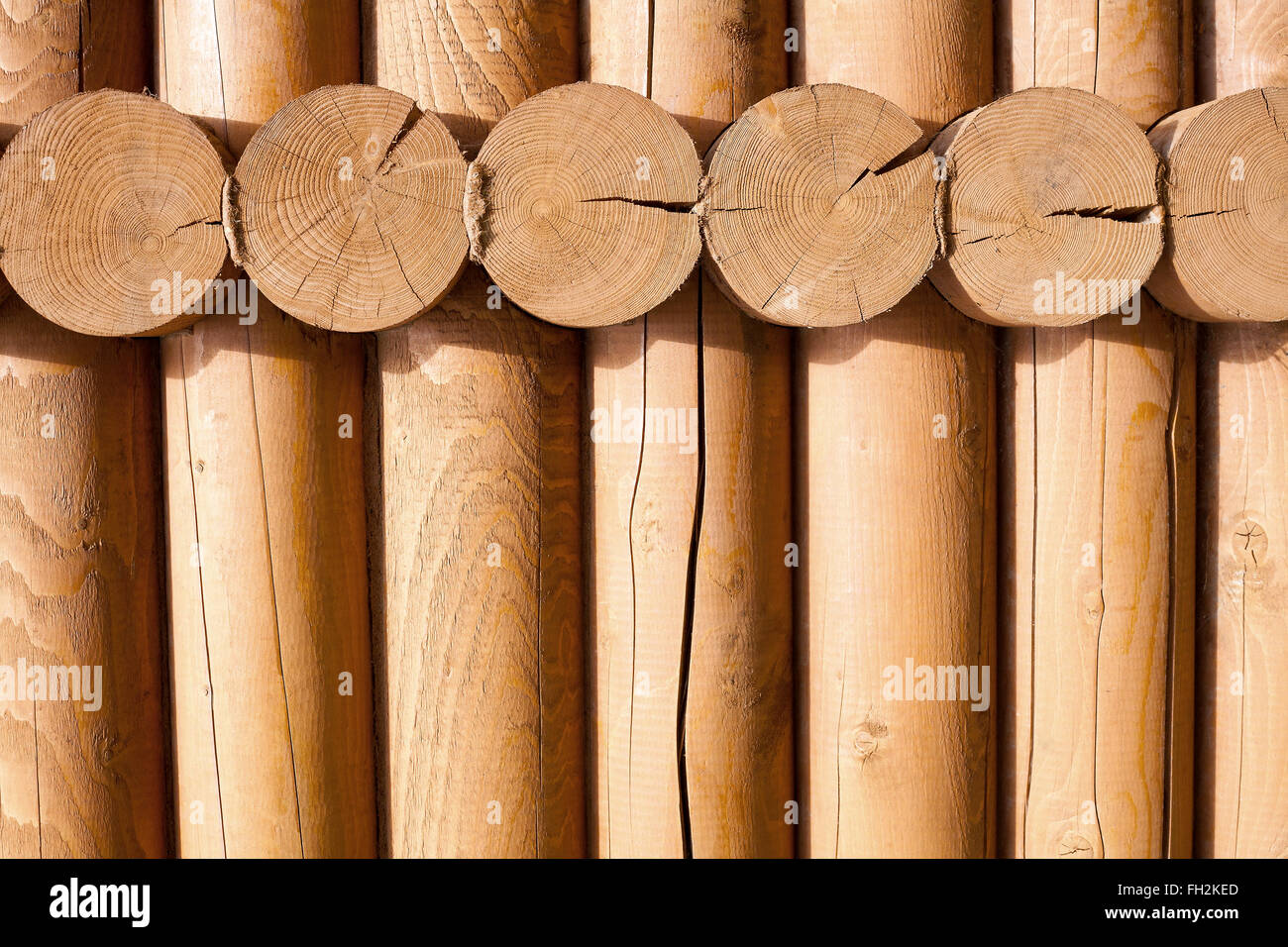 Natural background pattern of a log wall Stock Photo - Alamy
