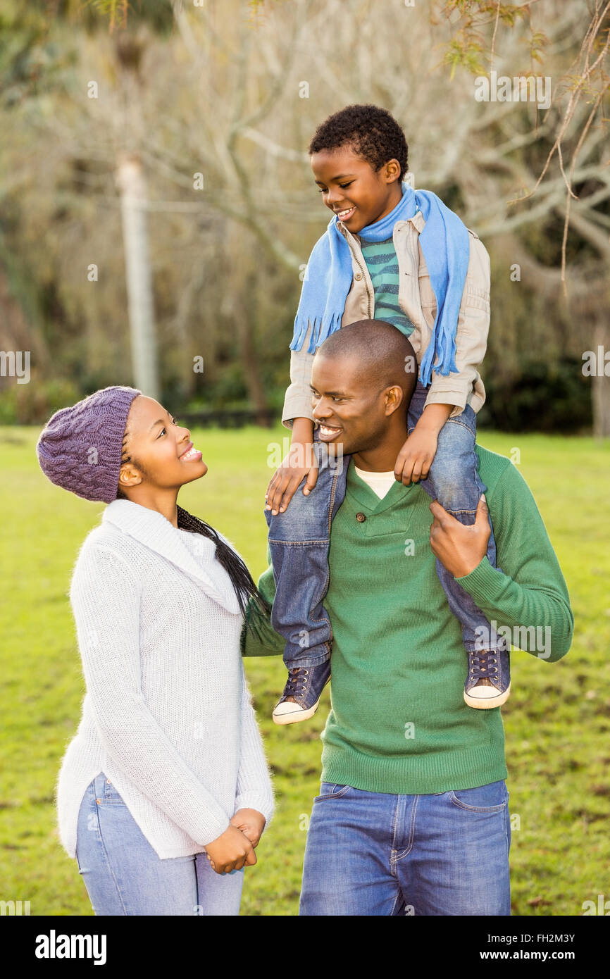 Happy family in the park Stock Photo - Alamy
