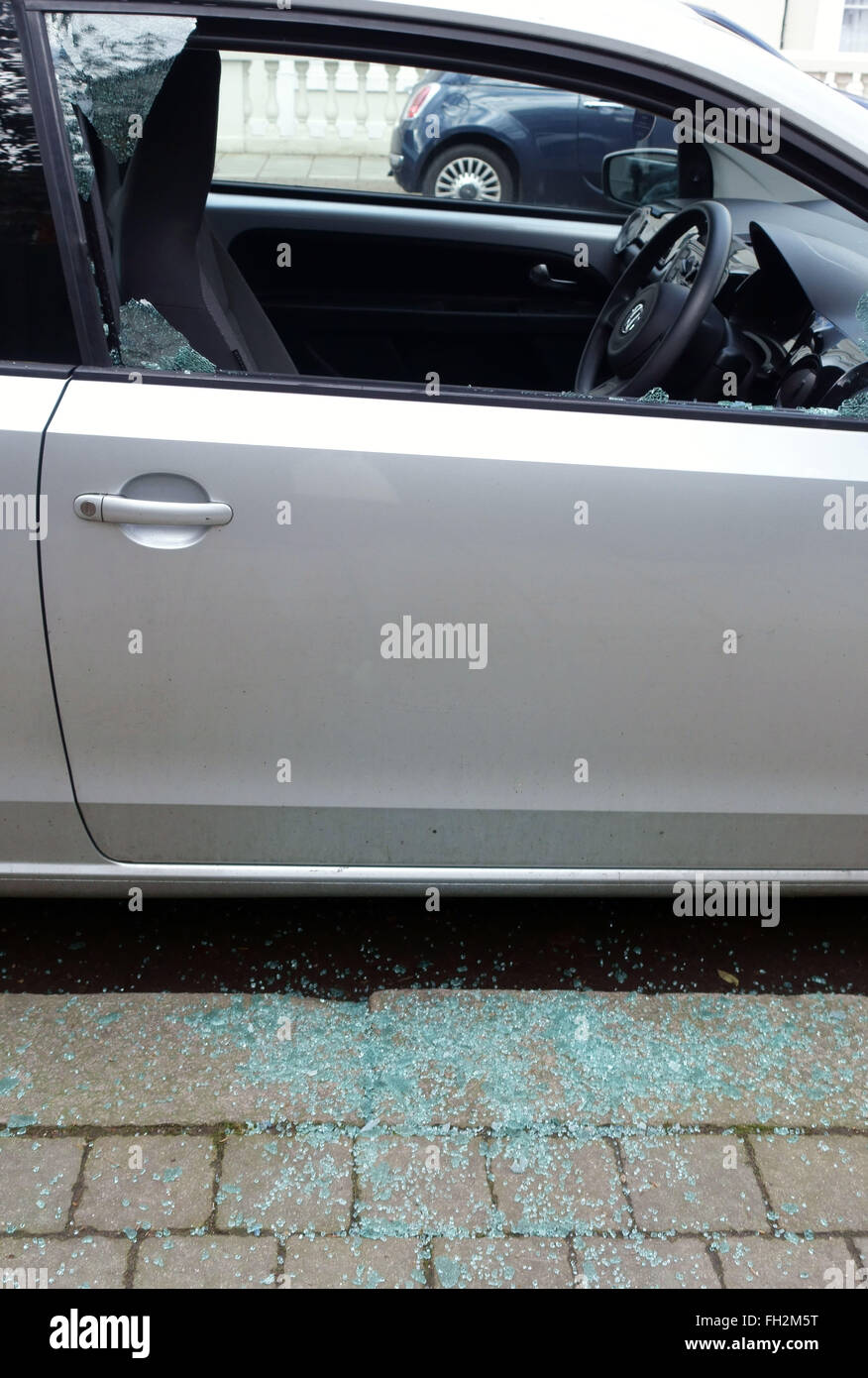 Smashed side window of parked car in South London Stock Photo Alamy