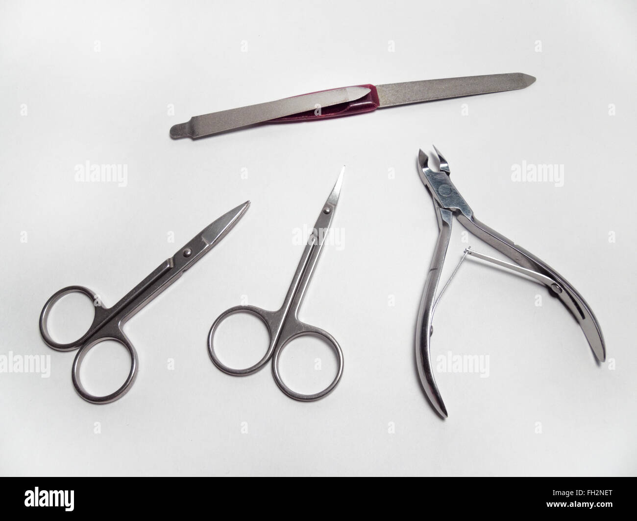 https://c8.alamy.com/comp/FH2NET/manicure-set-nail-nipper-straight-scissors-cuticle-scissors-nail-scissors-FH2NET.jpg